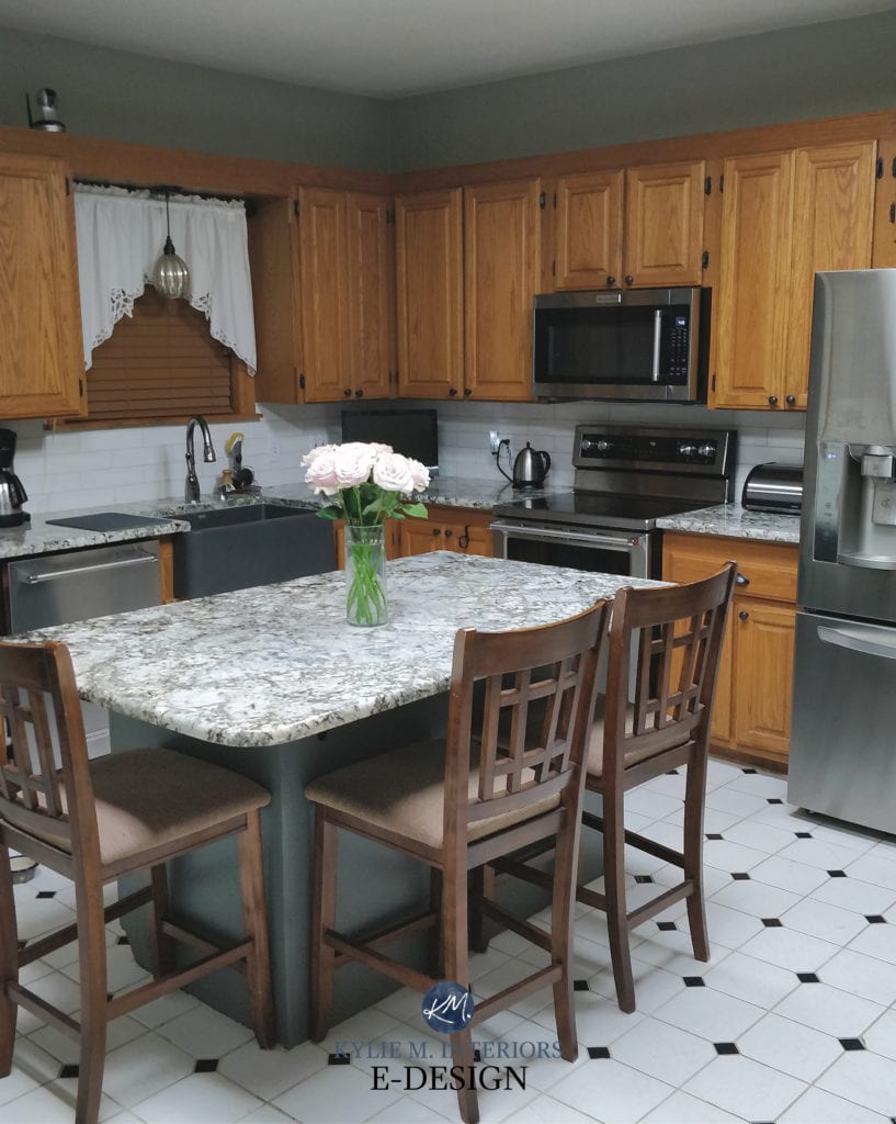 Oak kitchen cabinets, white and swirly granite quartz countertop, dark green Night Owl (Sherwin) island, Sensible Hue, white linoleum. Kylie M Interiors Edesign