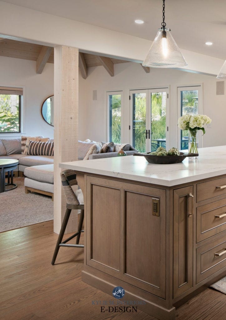 Red oak wood floors in kitchen with wood island, Caesarstone Staturio Nuvo white quartz countertop, pendants,White Dove walls. Kylie M Interiors E-Design update ideas