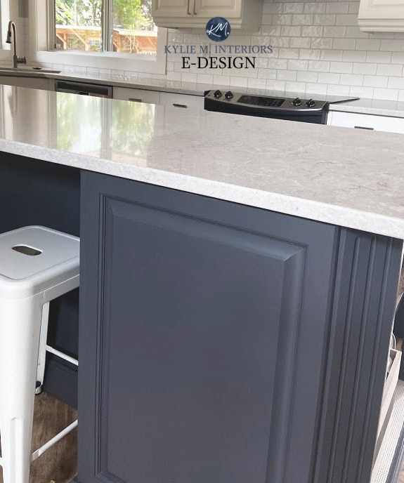 Sherwin Williams Cyberspace, white quartz countertop gray veining, dark navy blue popular cabinet or island colour. Kylie M Interiors Edesign
