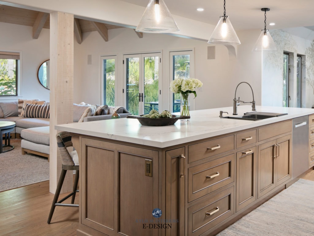 Statuario Nuvo white quartz countertop on wood island, red oak flooring, Caesarstone Statuario Nuvo marble look quartz countertop. Pendants, White Dove walls. Kylie M Interiors E-Design