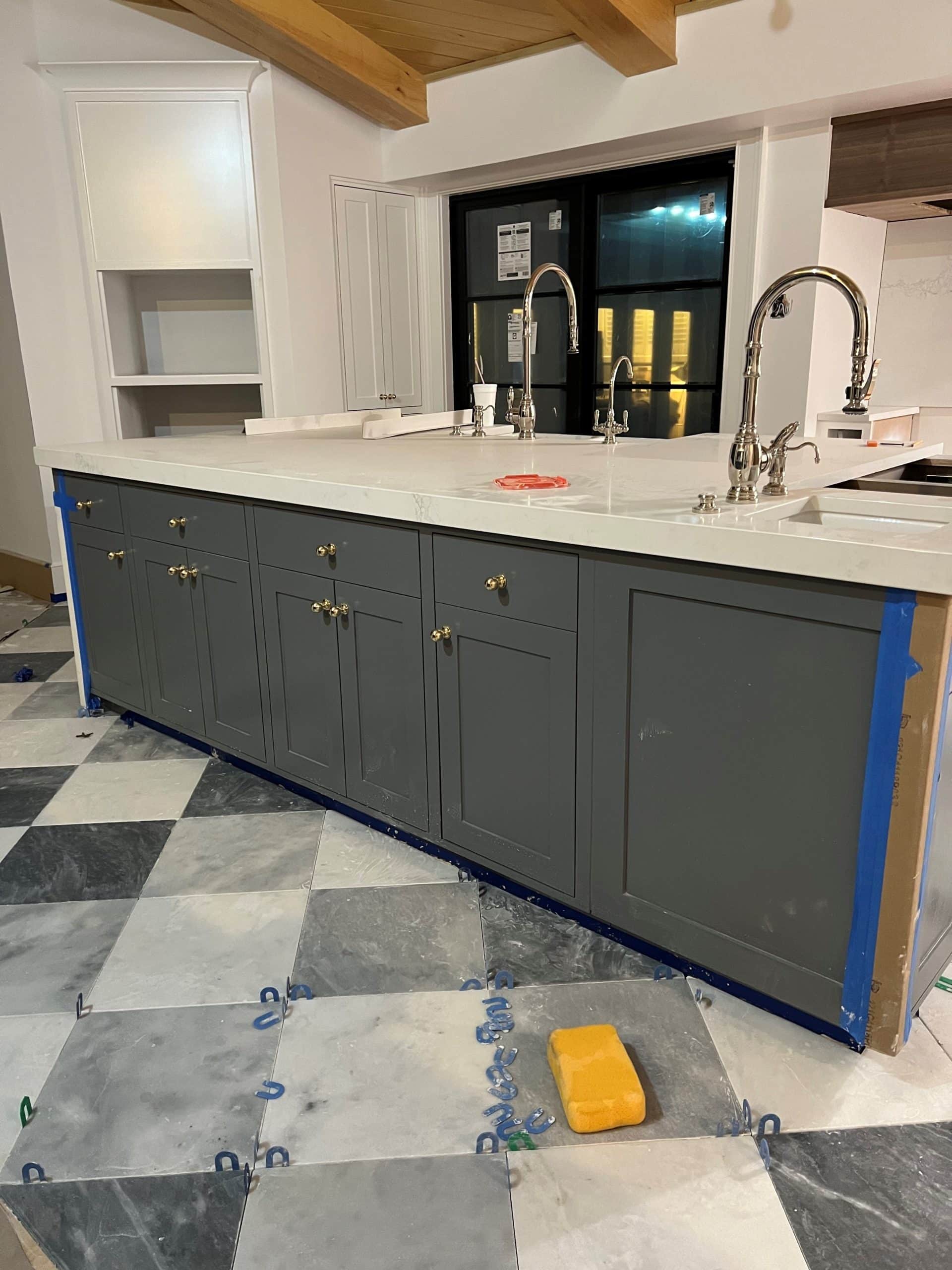 Trout Gray painted dark gray cabinets, marble tile floor in kitchen, Chantilly Lace walls and trim (Benjamin Moore) Kylie M Interiors Online paint color consulting (2)