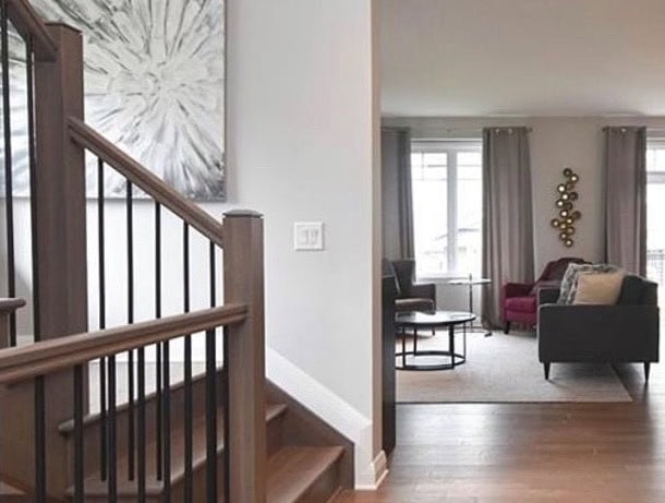 Wood staircase and floor, Sherwin Williams On the Rocks, Extra White trim, Kylie M Interiors Edesign, diy update ideas