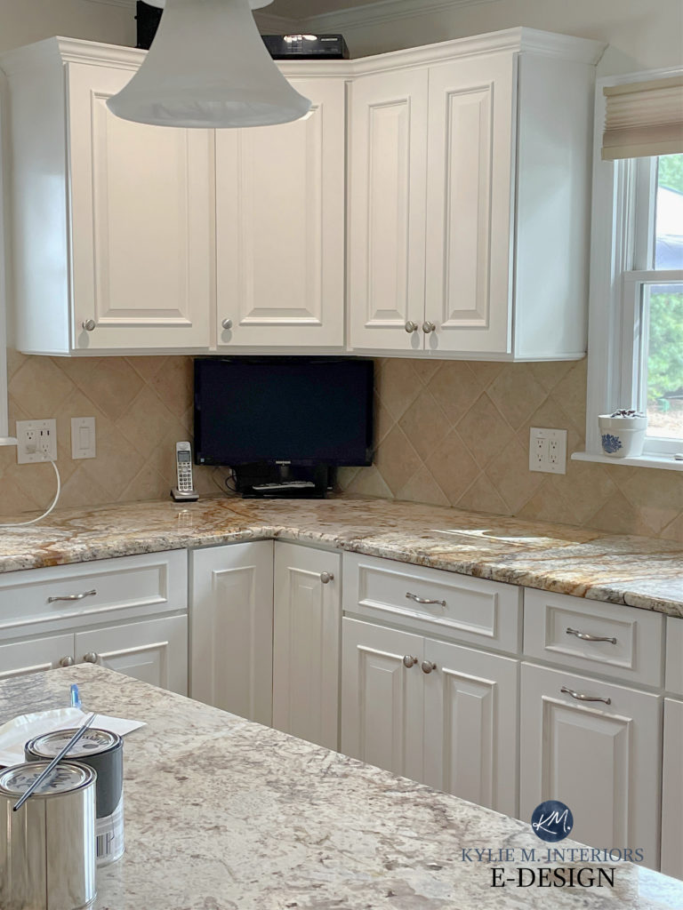 Older style granite countertops with travertine look backsplash. Wood cabinets painted Benjamin Moore warm soft white. Kylie M Interiors Edesign, diy update ideas