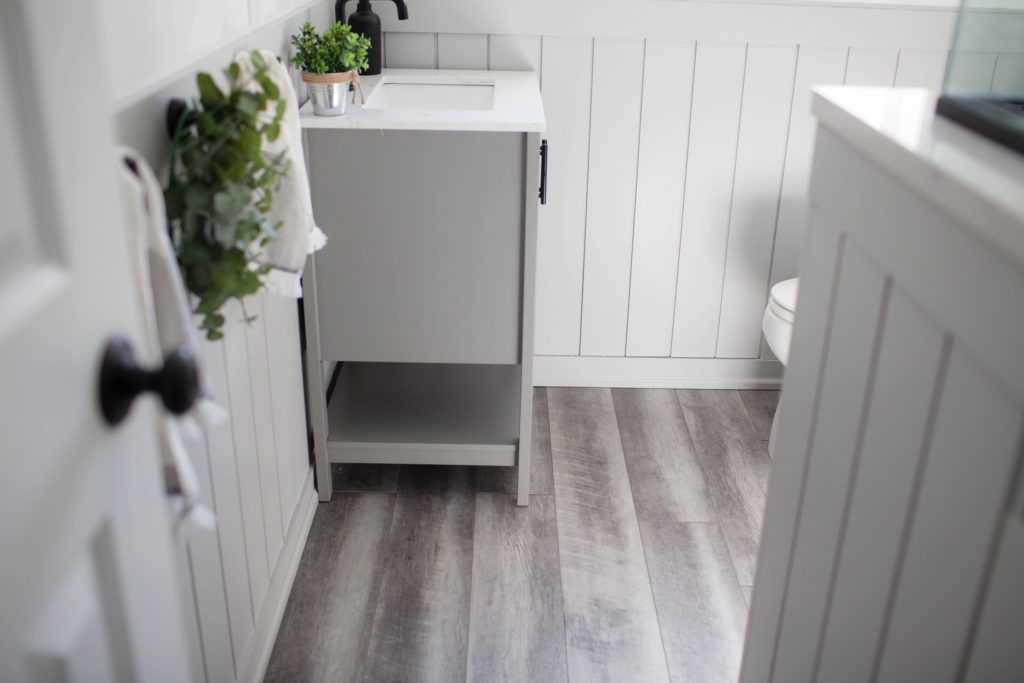 Small bathroom with wainscoting, boa
