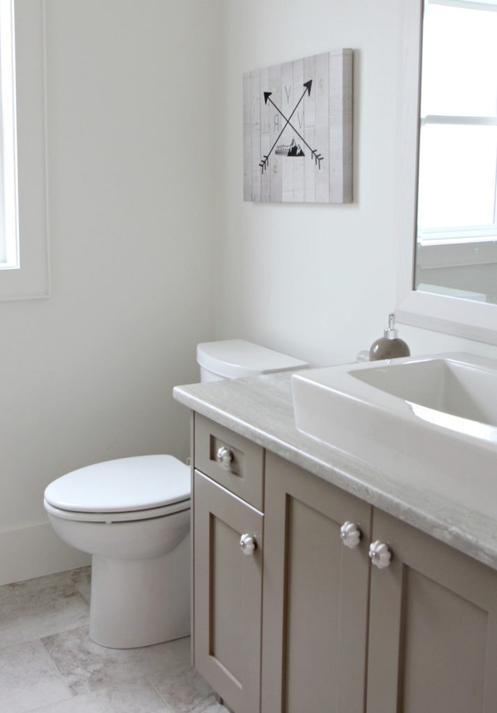 Sherwin Williams Kingport Gray, best greige taupe paint colour on bathroom vanity, laminate countertop, small bathroom. Kylie M Interiors Edesign