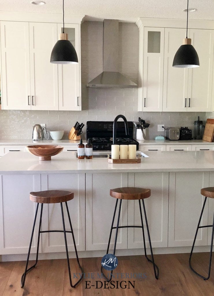 Benjamin Moore Cloud White with taupe greige subway tile backsplash, white quartz countertops, warm white painted cabinets. Kylie M Interiors
