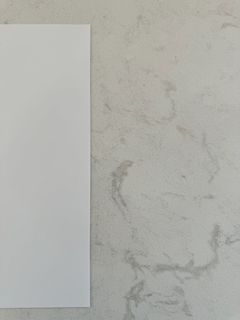 Cambria Torquay off-white quartz countertop with white paper