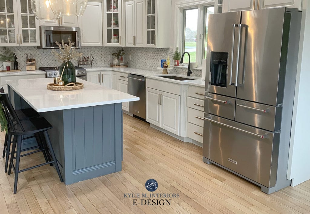 Classic Gray warm off white gray painted cherry cabinets, white quartz, marble backsplash, Roycroft Pewter island, white oak floor. Kylie M Interiors Edesign, kitchen update ideas