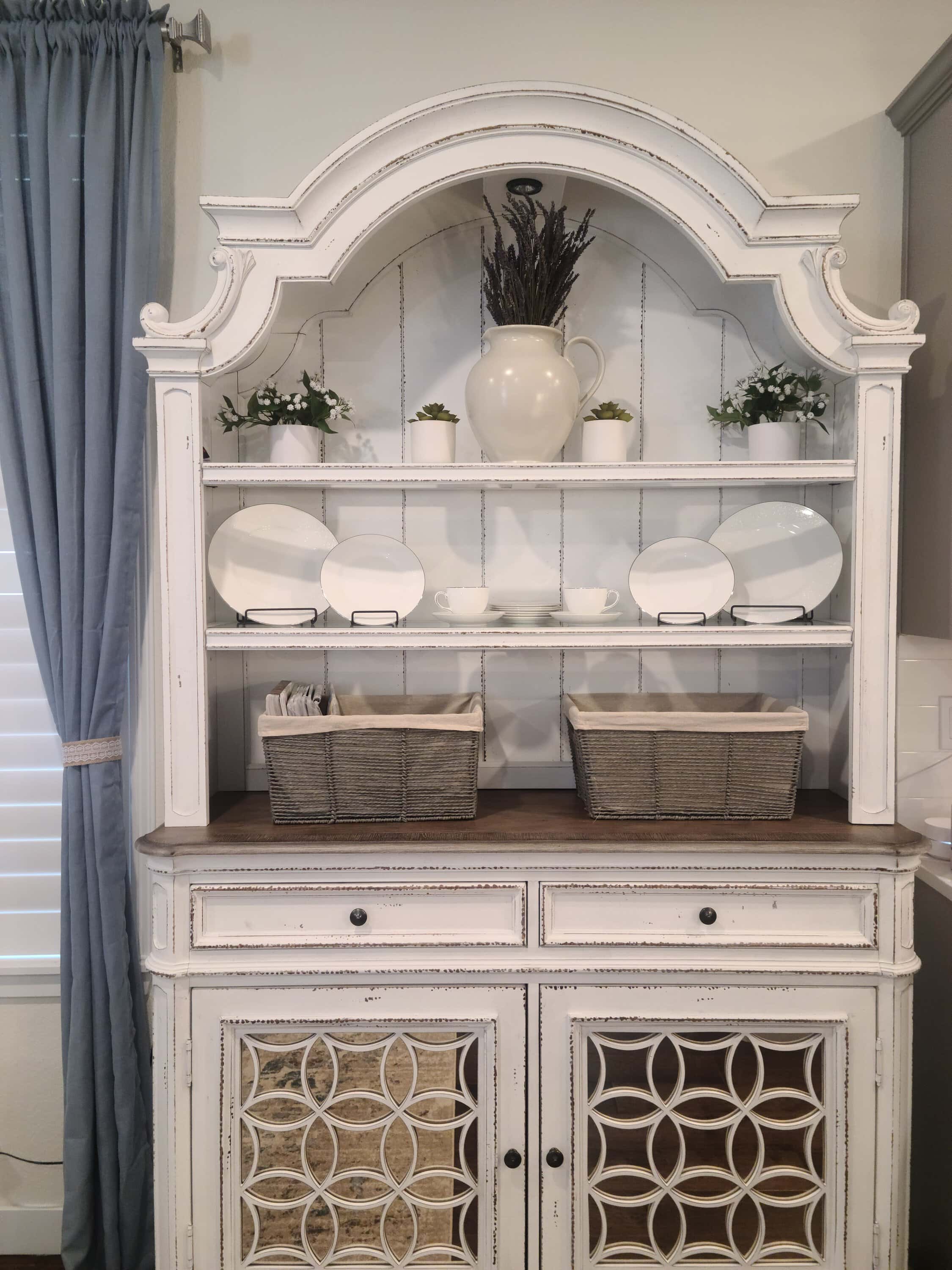 Country farmhouse home decor on painted buffet hutch or bookcase. Off-white or warm white. Kylie M Interiors CLIENT PHOTO