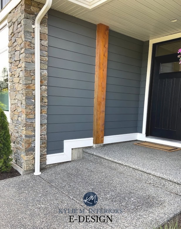 Exterior siding with stone, white trim, similar to Hardie Iron Gray. Sherwin Williams Roycroft Pewter, black front door. Kylie M Interiors Edesign, virtual DIY advice