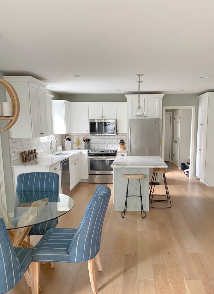 Kitchen and eating nook with Sherwin Austere Gray, best gray green, Pure White kitchen cabinets, island. Kylie M Interiors Edesign, CLIENT PHOTO