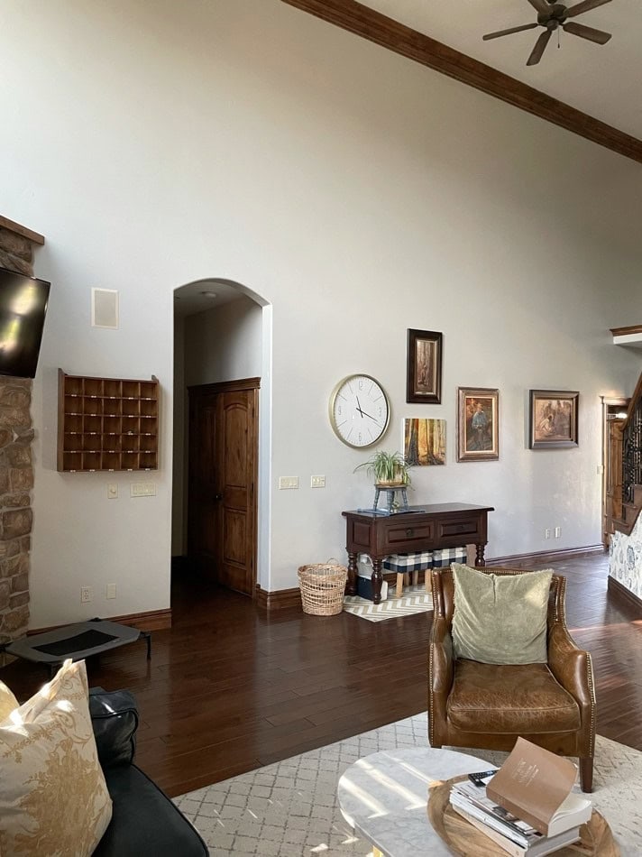 Revere Pewter in room with dark wood trim, dark wood floor. Kylie M INteriors edesign client photo