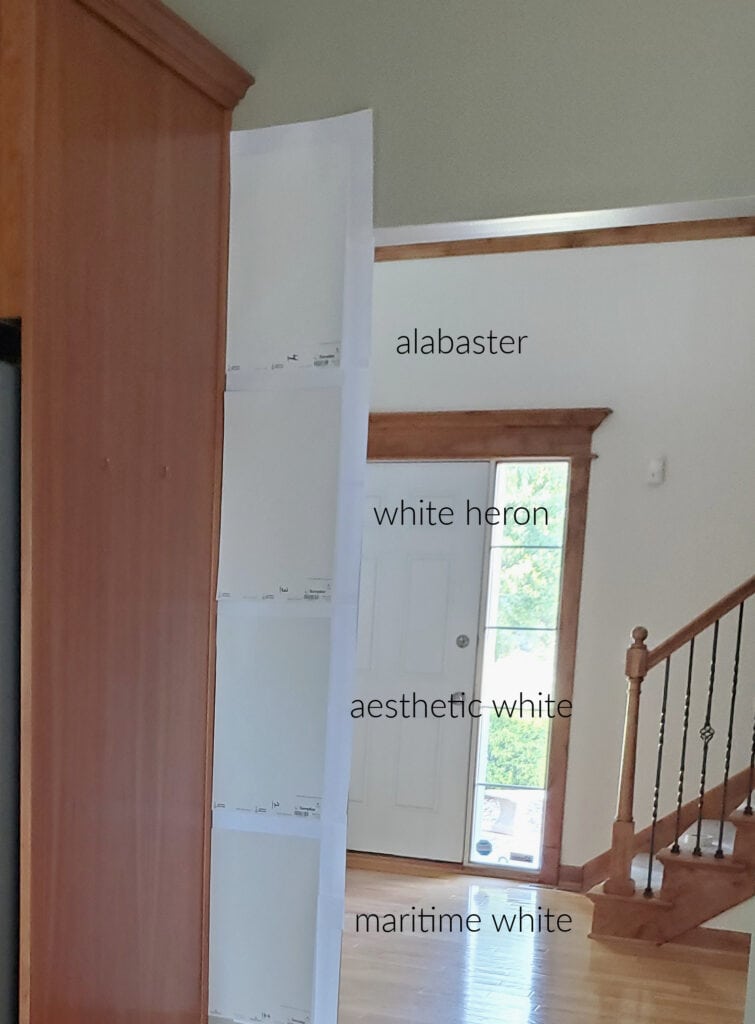 Sherwin Williams Alabaster, White Heron, Aesthetic White, BEnjamin Moore Maritime White with cherry red orange stain wood cabinets, ash or oak floor, granite countertop, Samplzie