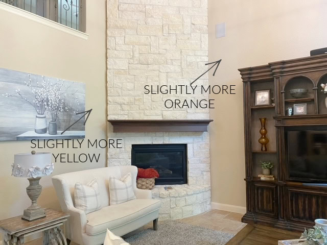 Sherwin Williams Kilim Beige paint colour with cream beige stone fireplace and dark wood, travertine floor. CLIENT BEFORE PHOTO Kylie M Interiors