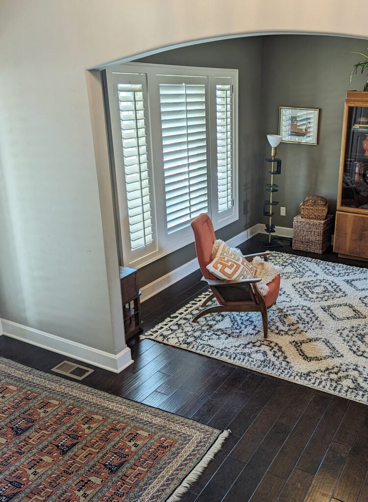 Sherwin Williams Natural Tan paint color on the trim, Taupe Tone walls, Benjamin Moore Fairview Taupe dining room accent walls, dark wood floor. (1)