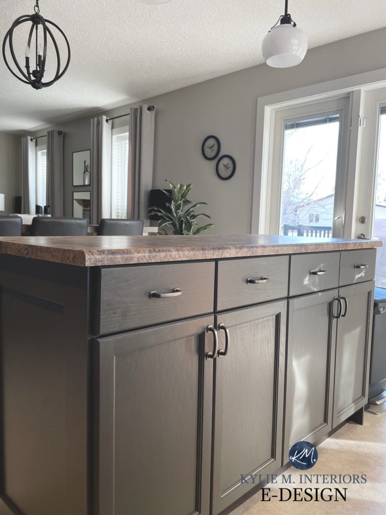 Sherwin Williams Urbane Bronze, granite look laminate formica countertops, vinyl kitchen floor, Natural Cream paint color walls. Update ideas for oak cabinets.
