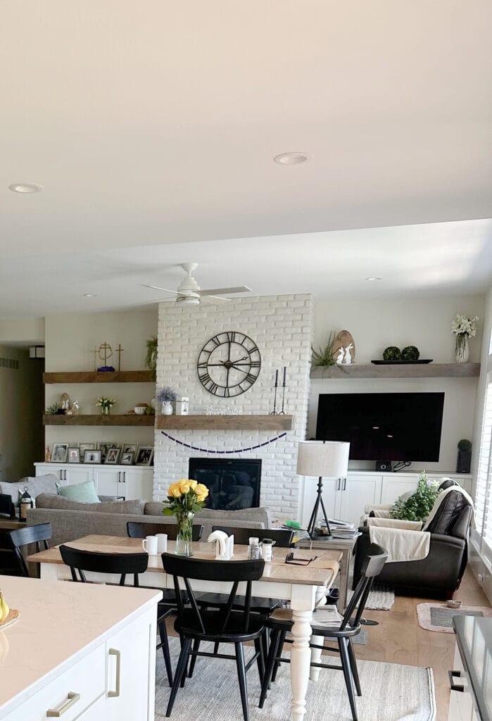 Sherwin Williams White Duck walls, painted brick fireplace, island kitchen cabinets Wellborn =Glacier, wood floor, modern farmhouse, wood shelves