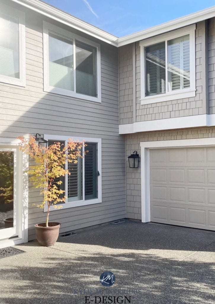 Exterior shignle siding painted Sherwin Williams Anew Gray darkened, Pure White trim. Garage Door. Kylie M Interiors Edesign