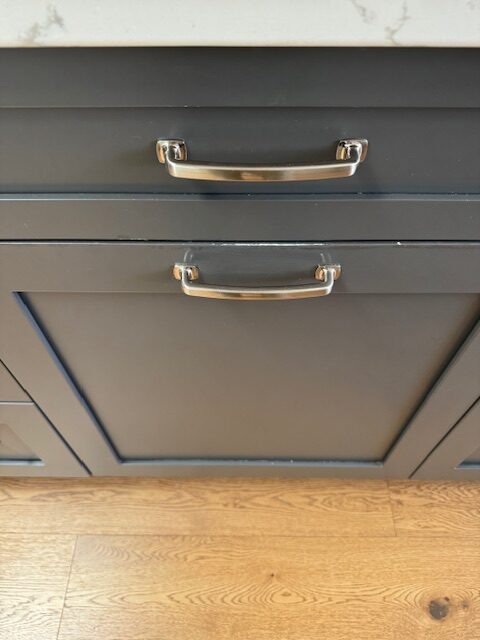 island cabinet with chips on it, otherwise painted cabinets are in great shape