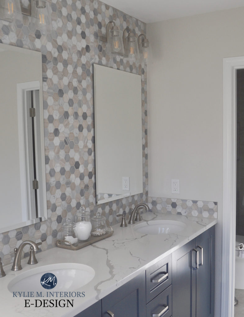 Ensuite bathroom, beige, blue white hexagon tile, navy blue vanity, white quartz countertop, Sherwin Williams Egret White paint color on walls. polished nickel. Kylie M Interiors Edesign (2)