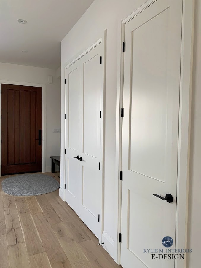 Interior doors painted Benjamin Moore White Dove, white oak look flooring, black hardware. Kylie M Interiors Edesign, diy update ideas