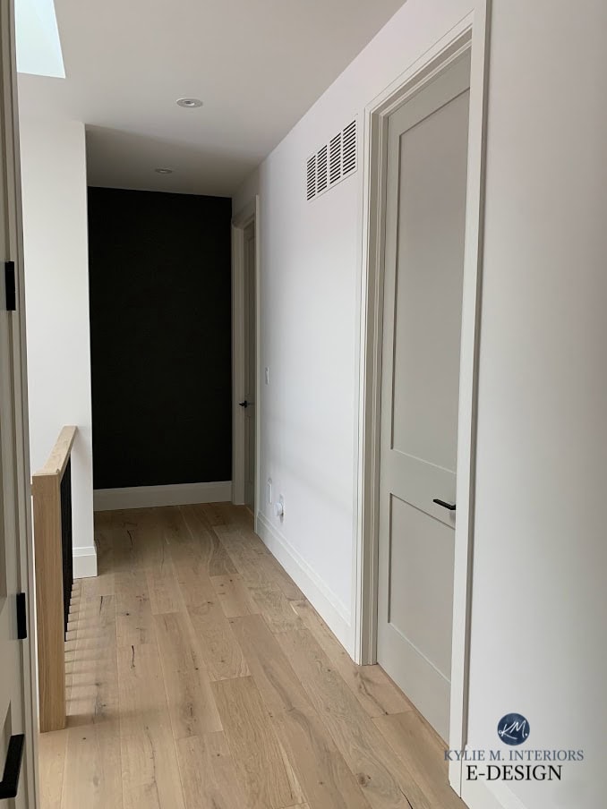 Interior hallway doors painted Benjamin Moore Revere Pewter, White Dove walls and trim, Amherst Gray feature wall, white oak floor. Kylie M Interiors Edesign