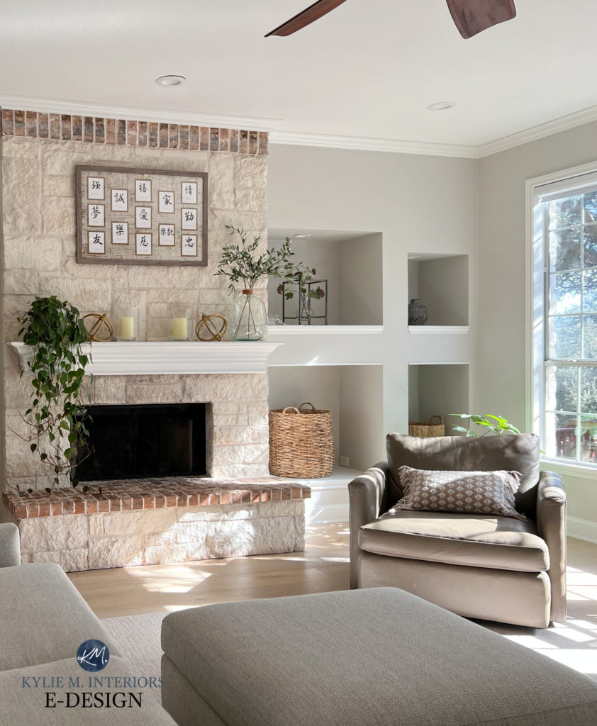 Sherwin Williams Crushed Ice gray paint colour with warm beige cream stone fireplace, Pure White trim and mantel. Kylie M Interiors Edesign, warm exposure.