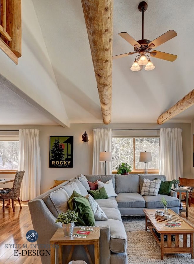 Vaulted ceiling in rustic style livingroom, Benjamin Moore Edgecomb Gray paint colour on walls, wood trim. Kylie M Interiors Edesign, sectional