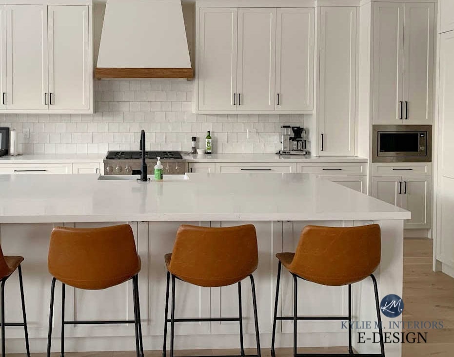 White Dove painted kitchen cabinets, zellige tile backsplash, Calacatta Botanica white quartz marble look countertop, counter stools cognac leather. Kylie M Interiors Edesign