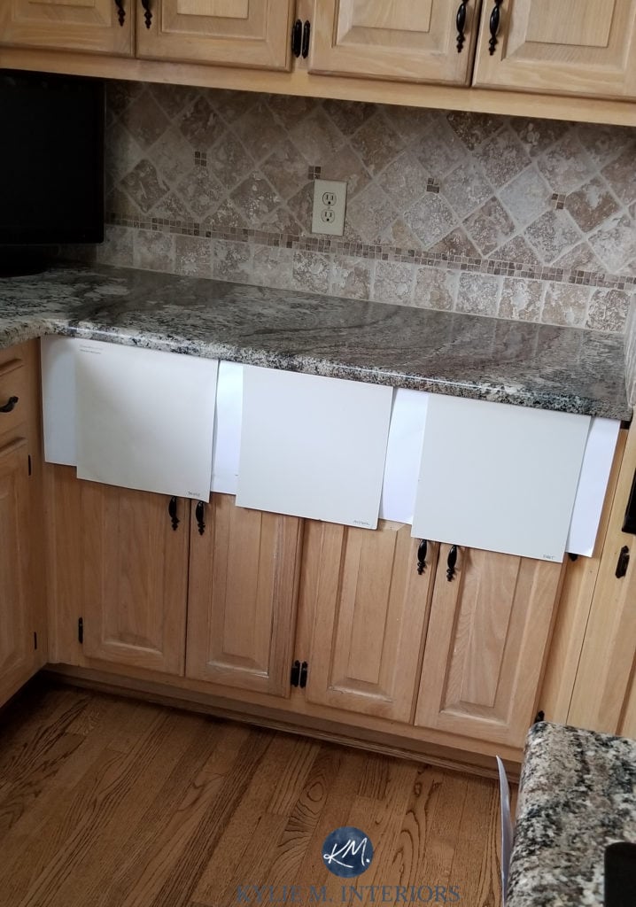 Divine White, Aesthetic White, Egret White Sherwin Williams off-white cabinet paint colours with granite and travertine