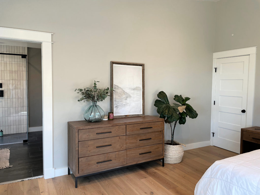 Sherwin Williams best warm gray paint colour for walls, Repose Gray. LIght wood floor and dresser. Kylie M.