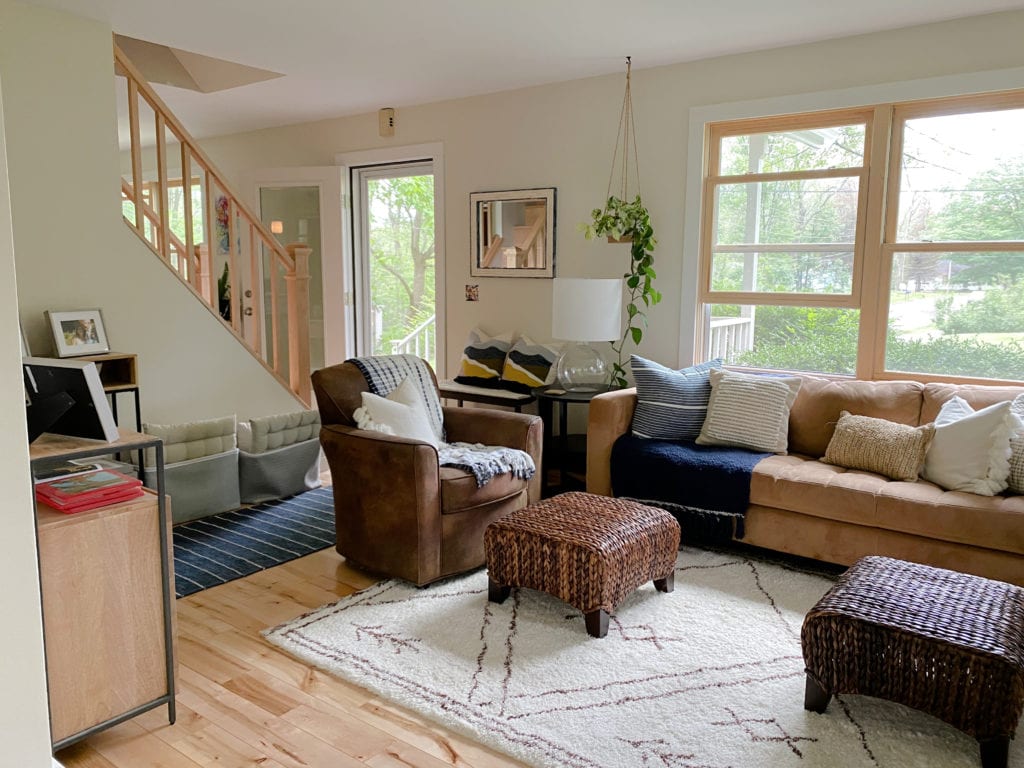 Benjamin Moore Cake Batter in living room with beige sofa, brown chair.