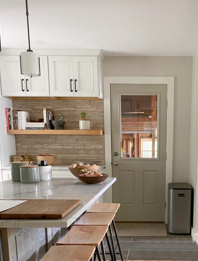 Benjamin Moore Edgecomb Gray and Hancock Gray on painted pantry door, kitchen island and floating shelves.
