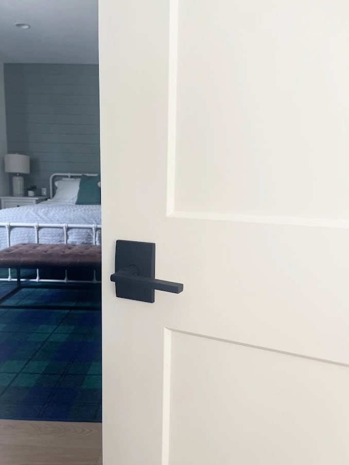 schlage door hardware, latitude lever, century trim on bedroom door painted White Dove