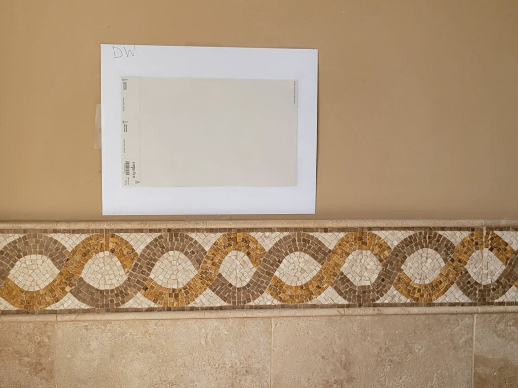 Sherwin Williams Divine White, bathroom with travertine tile and accent tile. updating ideas. Kylie M paint color blogger