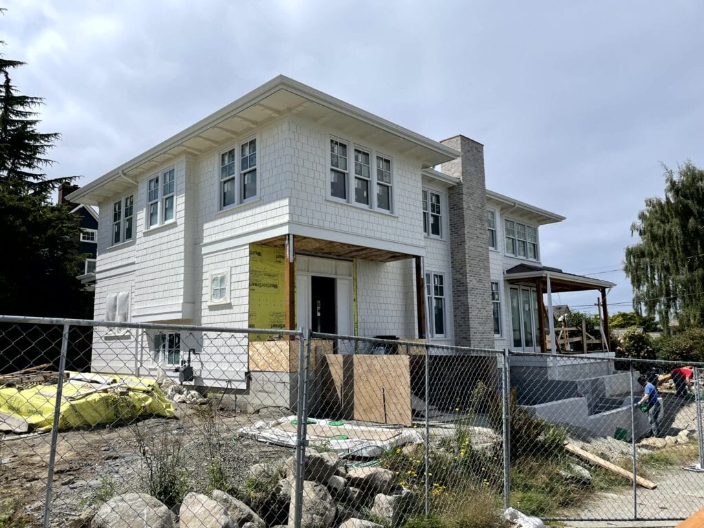 Sherwin Williams Pearly White warm off white on exterior, yellow undertone