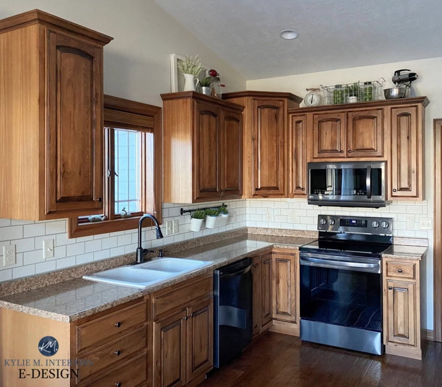 Best paint colors to update wood cabinets, trim, flooring. Granite look laminate countertop, handpainted diy subway tile backsplash, wood. Ballet White, Kylie M Edesign