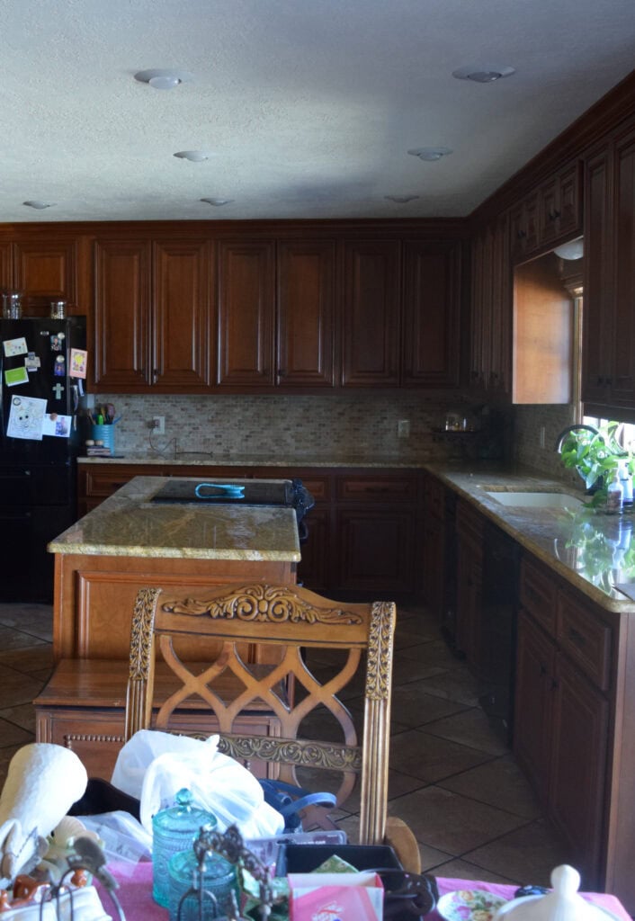 BEFORE kitchen cabinets being painted, wood cabinets, travertine, granite, tile floor (2)