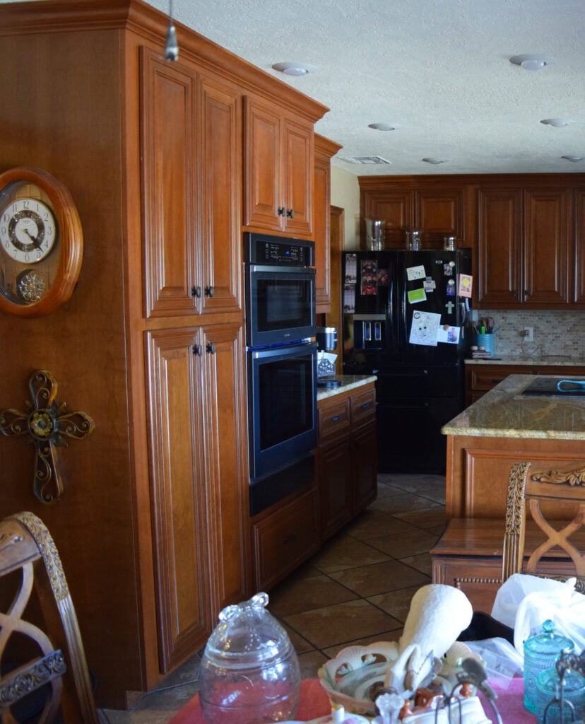 BEFORE kitchen cabinets being painted, wood cabinets, travertine, granite, tile floor (3)
