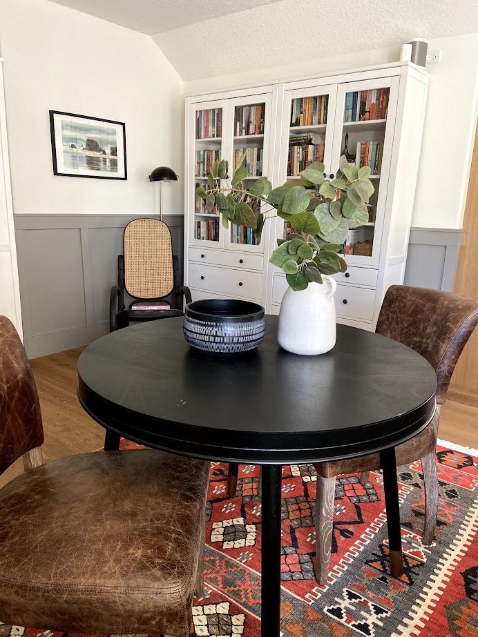 Ikea Hemnes white bookcase hutch with books and novels, Benjamin Moore White Dove and Graystone board and batten. Kylie M Interiors online expert