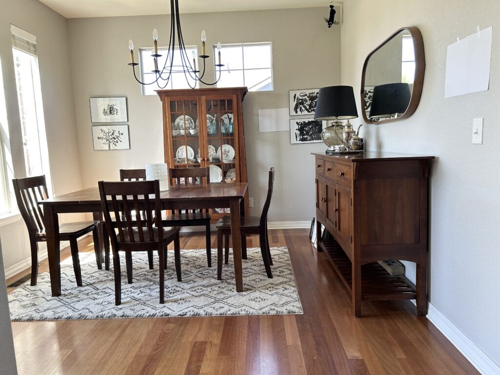 Stonington Gray in a south or westfacing room with wood floor and furniture. Looks much warmer