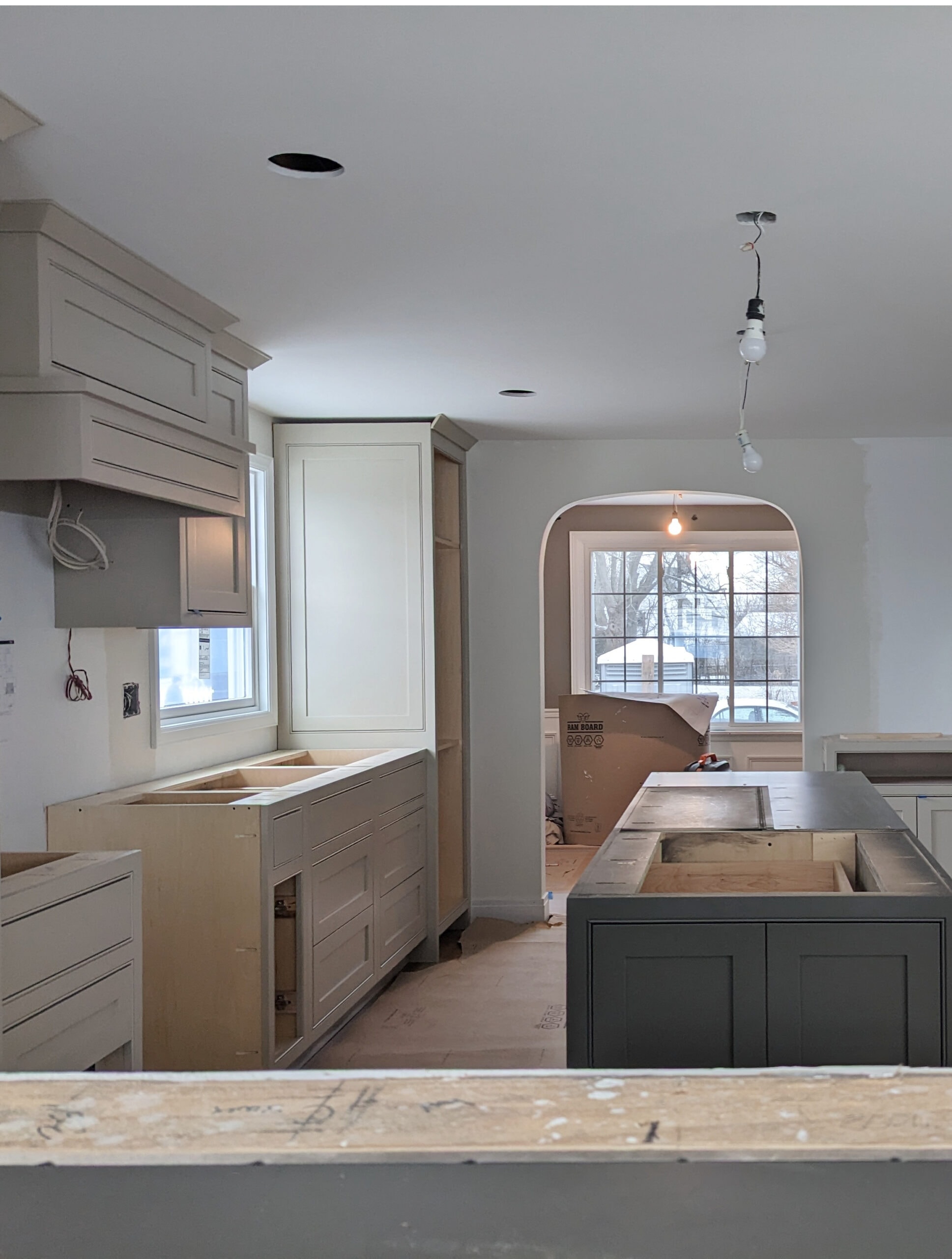 Kitchen remodel, mid update Benjamin Moore Pashmina best greige taupe cabinets, Urbane Bronze island. Kylie M Online paint color consulting