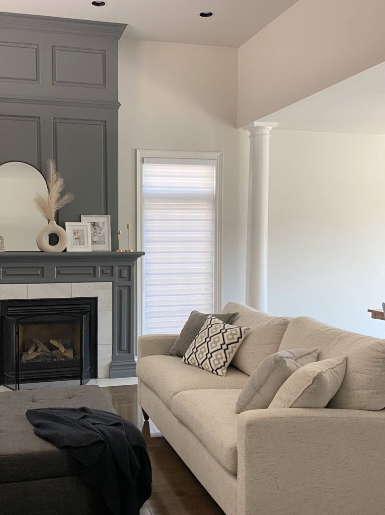 Sherwin Williams City Loft, Benjamin Charcoal Slate paint color on fireplace molding, home decor, taupe sofa. Kylie M Interiors Online Paint color