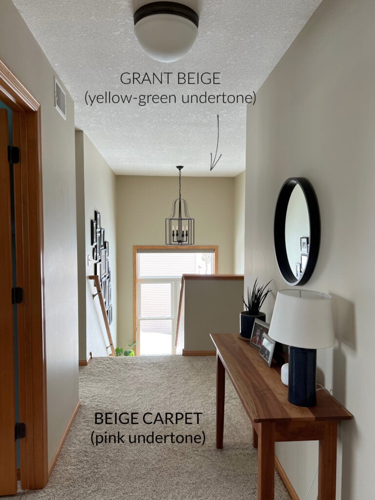 Benjamin Moore Grant Beige not matching beige carpet in hallway.