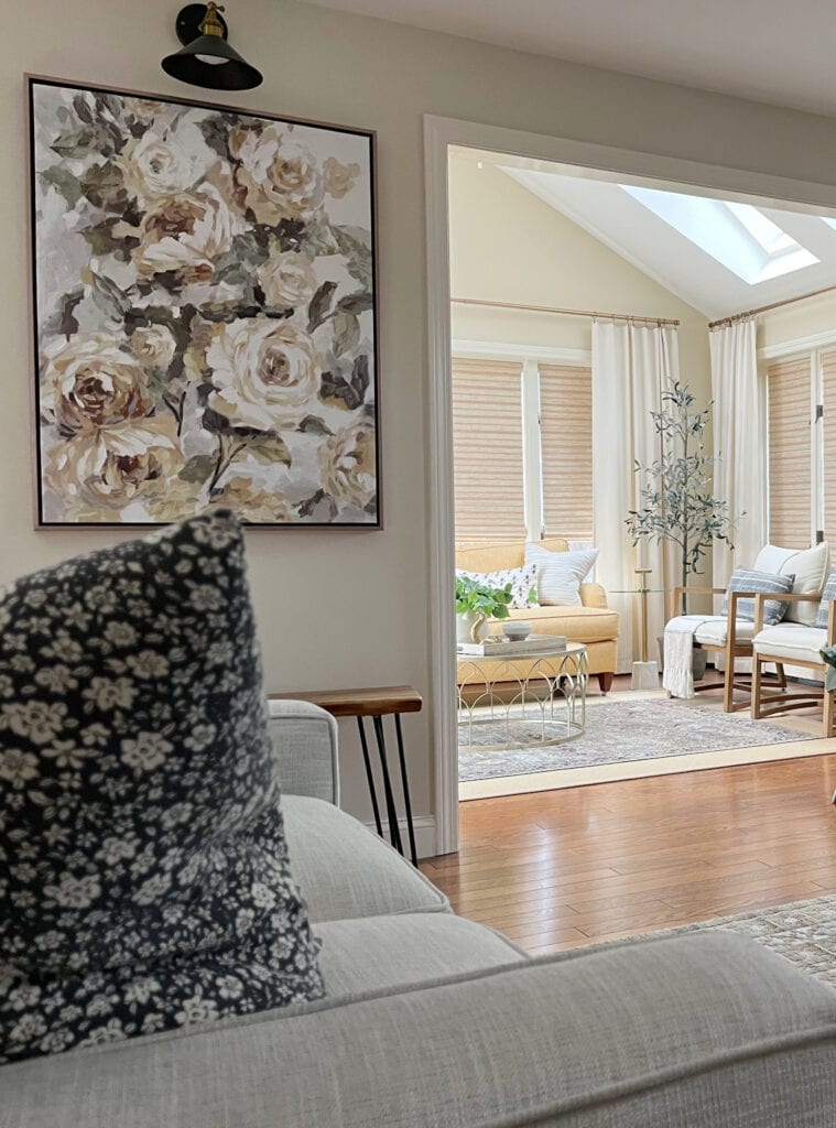 Benjamin Moore Natural Wicker in sunroom, Sherwin Williams Neutral ground in family room, not the best match.