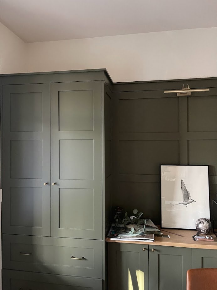 Dark green painted cabintes in a home office similar to BEnjamin Moore Dark Olive