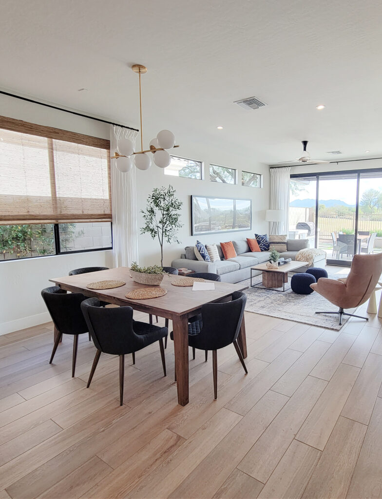 Dunn Edwards Foggy Day lightened similar to Sherwin Drift of Mist, wood floor, open concept dining and living, Dune trim, Home staging ideas