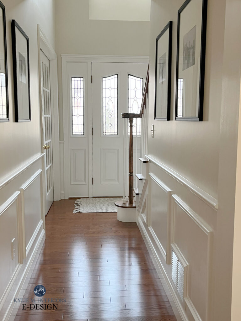 Hallway, front door, entryway in Benjamin MOore Ballet White with White Dove trim, popular warm off white paint color with red stain oak wood floor