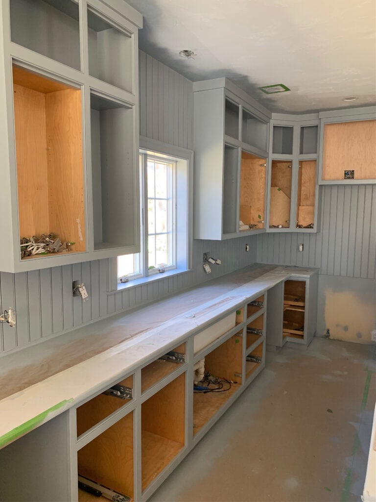 Sherwin Williams Uncertain Gray on painted kitchen cabinets