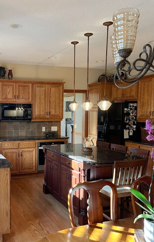 ideas to udpate a kitchen with oak wood cabinets, black granite and 4x4 backsplash tile